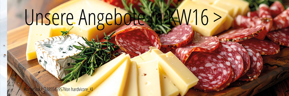 wir sehen eine Holzplatte mir Salami und Käse